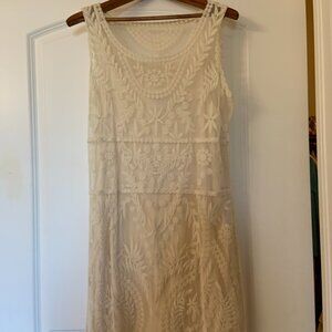 White sleeveless embroidered dress